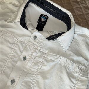 Men’s Kuhl brand dry fit short sleeve button up shirt.